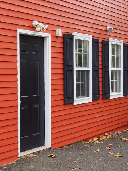 Professional Red Vinyl Siding Installation
